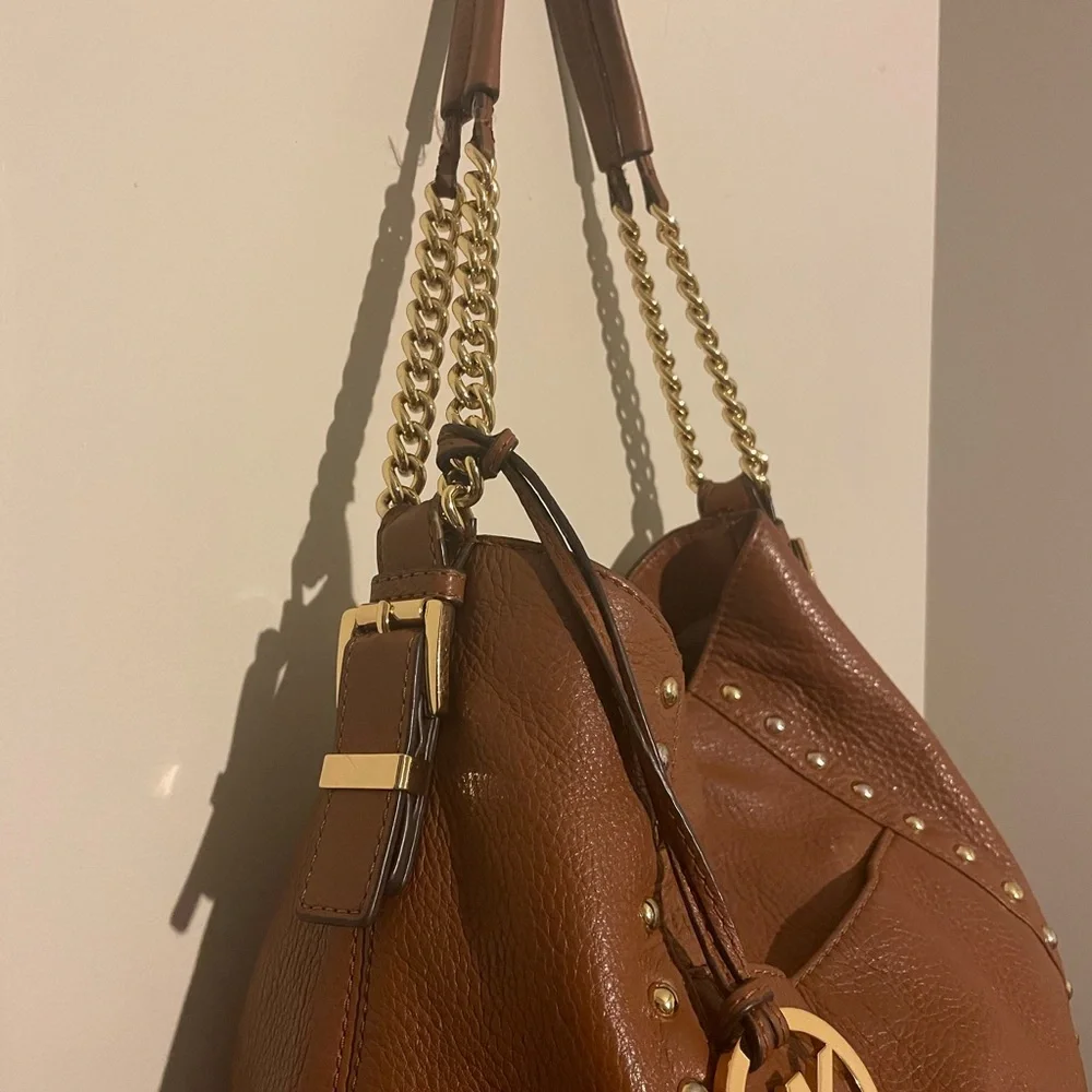 Michael Kors cognac pebbled leather hobo bag w hang tag